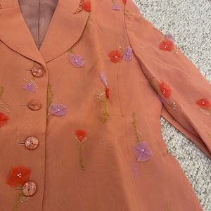 Retro Vintage Bergamo peach suit. detailed stitching. sheer flower designs